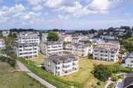 Urlaub Ferienwohnung A: Haus Rügenscher Bodden Whg. 04 mit Meerblick