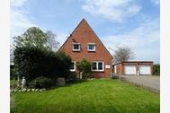 Urlaub Ferienwohnung Bi Oddi: moderne FeWo mit Terrasse und Garten