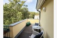Urlaub Ferienwohnung S: Grüne Düne Whg. 23 Meeresrauschen mit Kamin, 3 Balkonen