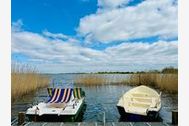 Urlaub Ferienhaus Boddenhuus - Traumhaus mit Steg und Ruderboot