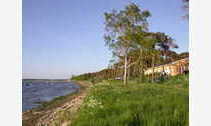 Urlaub Ferienwohnung Blaues Strandhaus mit Boot am Salzhaff, 50m zum Strand