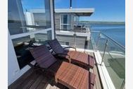 Urlaub Ferienhaus 01. Floating Houses (95 m²) mit Kamin