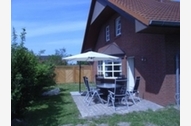 Urlaub Ferienhaus Norderpiep 31 Ferienhaus mit eingezäuntem Garten , Wlan