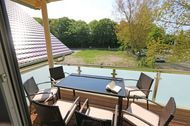 Urlaub Ferienwohnung F: Haus Sterntaucher Whg 08 Abendsonne mit Balkon