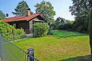 Urlaub Ferienhaus Blockhaus mit W-LAN - grosse Terrasse mit Strandkorb