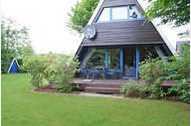 Urlaub Ferienhaus Zeltdachhaus mit W-LAN und grosser Terrasse